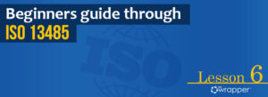 Blue header banner for "Beginners guide through ISO 13485" Lesson 6, featuring the qmsWrapper logo and a globe graphic illustrating international medical device quality standards.