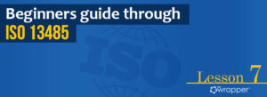 Blue header banner for "Beginners guide through ISO 13485" Lesson 7, featuring the qmsWrapper logo and a globe graphic representing global medical device quality standards.